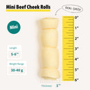 Mini beef cheek roll with measurement scale on a white background